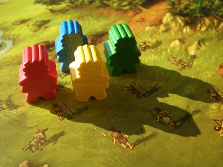 
Meeples of the Stone age board game  
